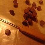 Drill a pilot hole for your pretzel sticks.